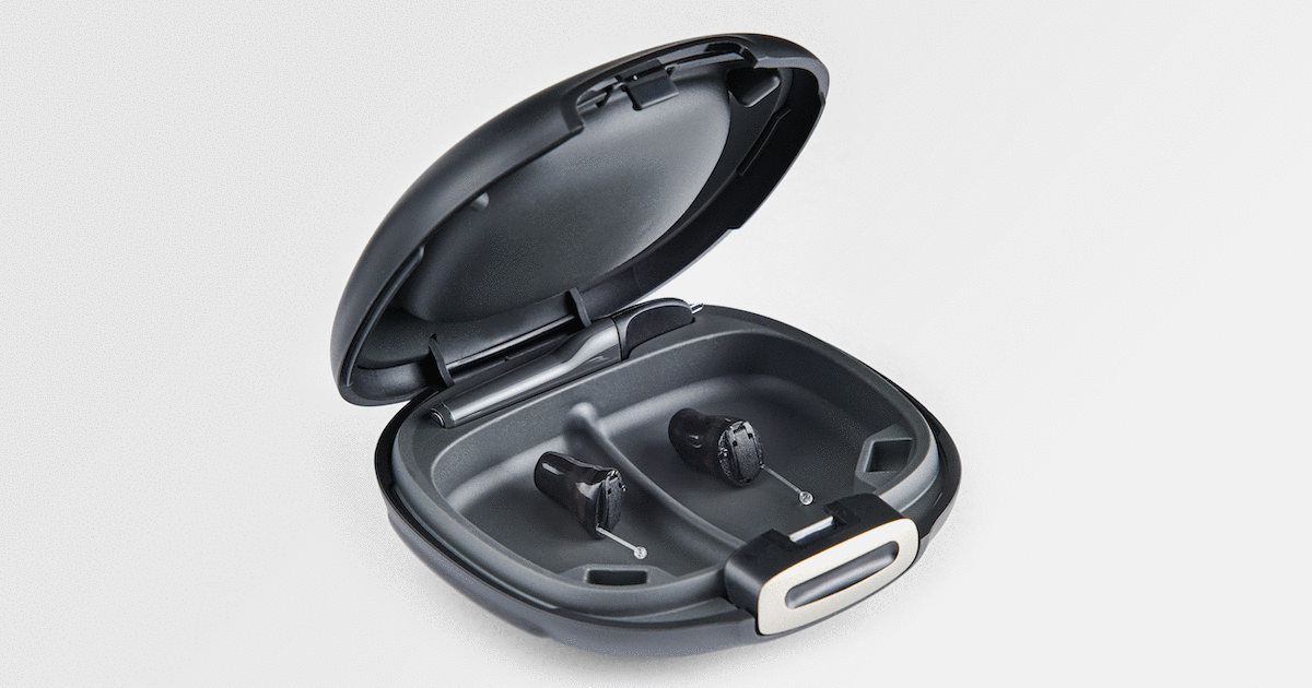 Oticon Own invisible-in-canal hearing aid with its case