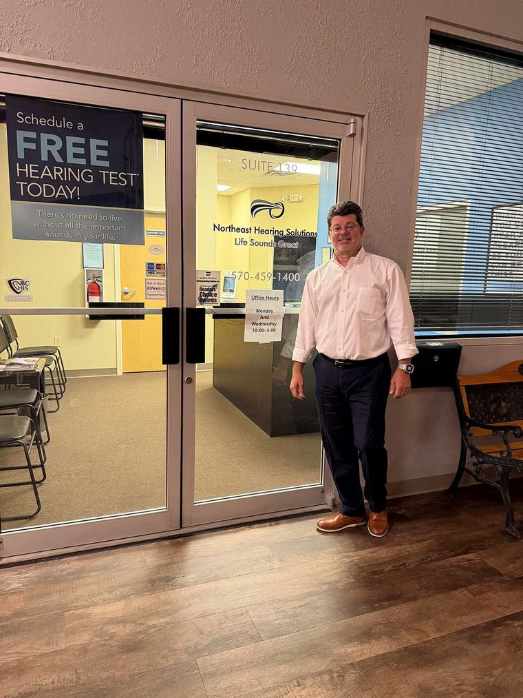 Nevin G. Balliet outside the Northeast Hearing Solutions office at 426 Airport Rd, Suite 139, Hazle Township, PA